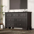 Comò nero a 7 cassetti con maniglie in metallo, finitura legno vintage – Montaggio da 1 persona